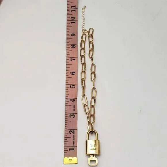 Authentic Louis Vuitton Lock and Key Gold Color with Gold Plated Chain Necklace - Picture 5 of 9